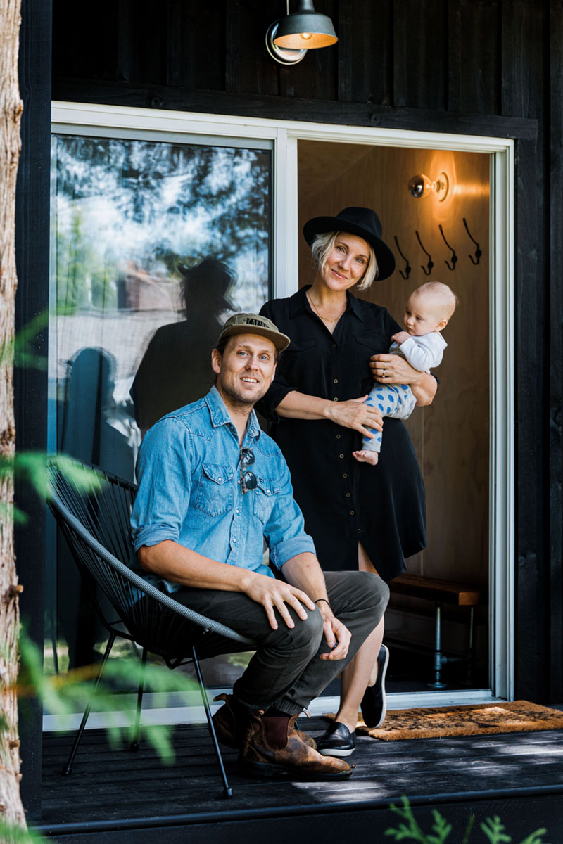 family photo outside the bunkie at Raina and Wilson's shared cottage