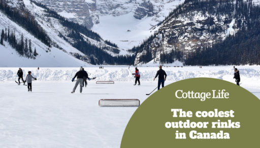 Group of people playing hockey on a frozen lake in Canada with glacier in the background