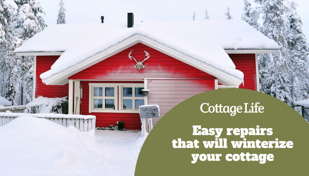 red wooden cottage in a snow landscape