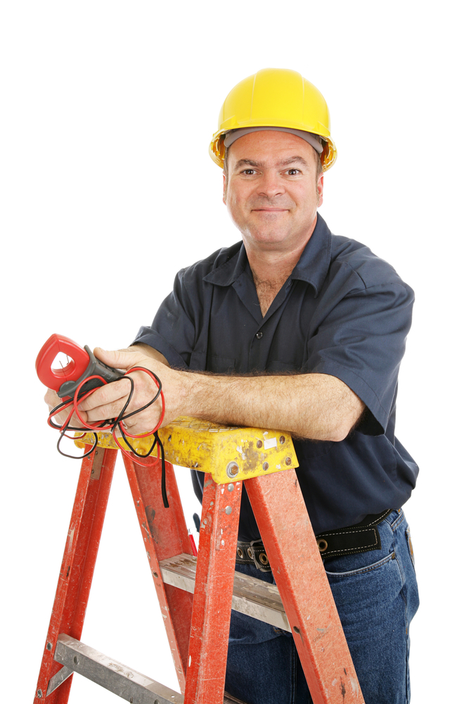 A man standing on fibreglass ladder