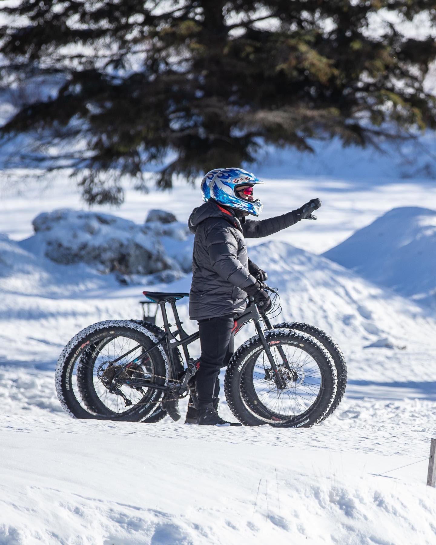 Man on fat bike trail in snow