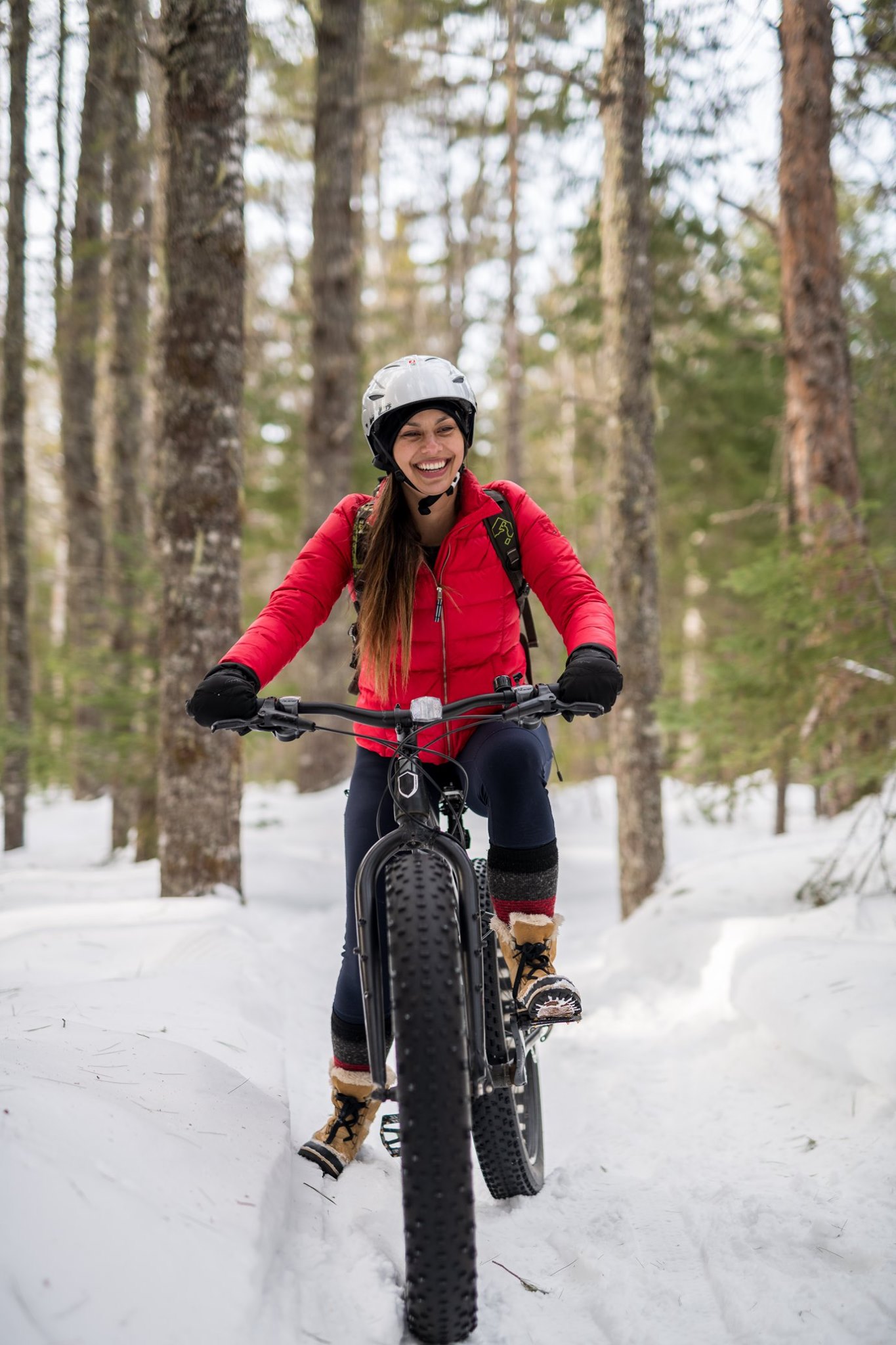 Woman on snowy fat biking trail