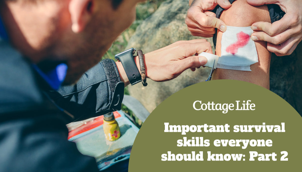 Young man healing knee to a young woman who has been injured doing trekking