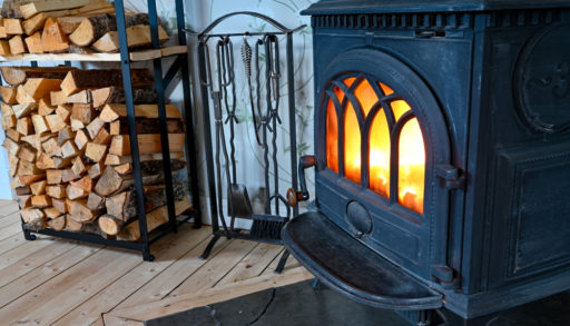 cozy wood stove with fire burning inside