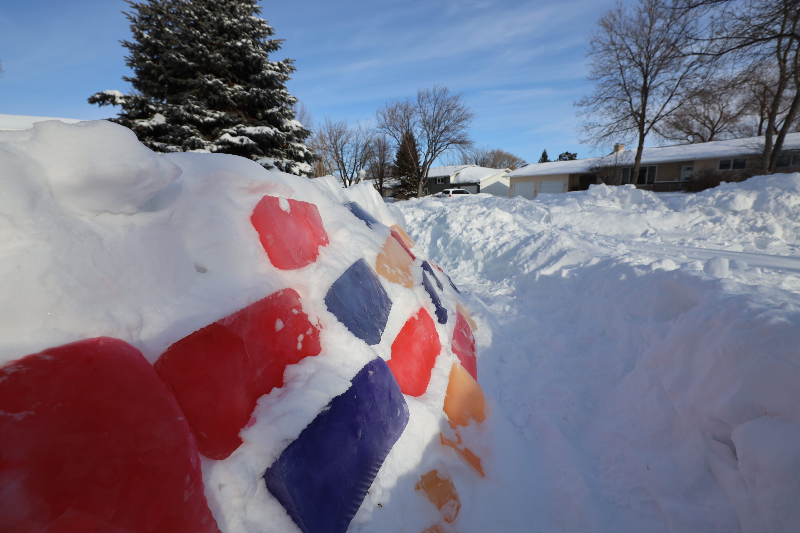 Side view of a colourful igloo.