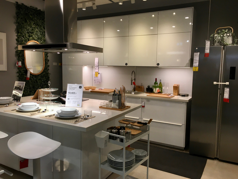 A kitchen with lights under cupboards
