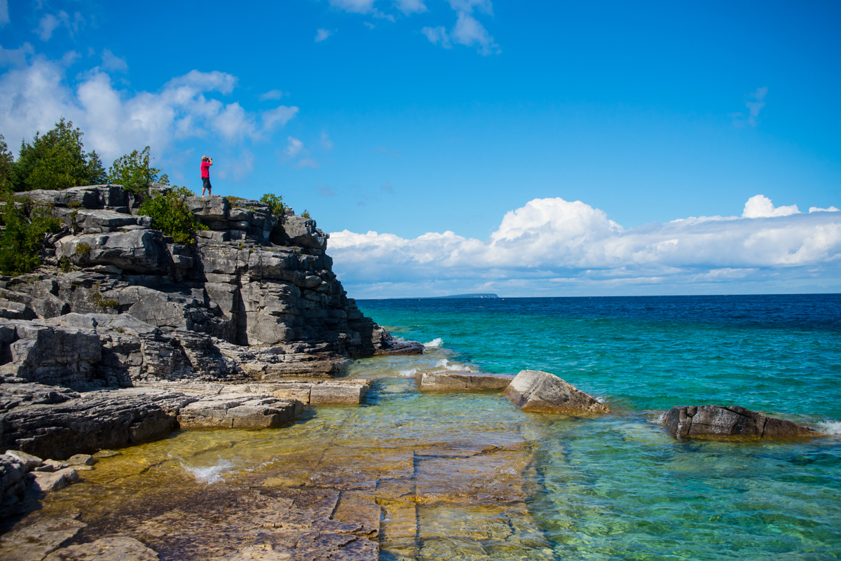 A cliffside and turquoise water