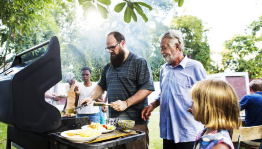 A group of people enjoying a barbecue