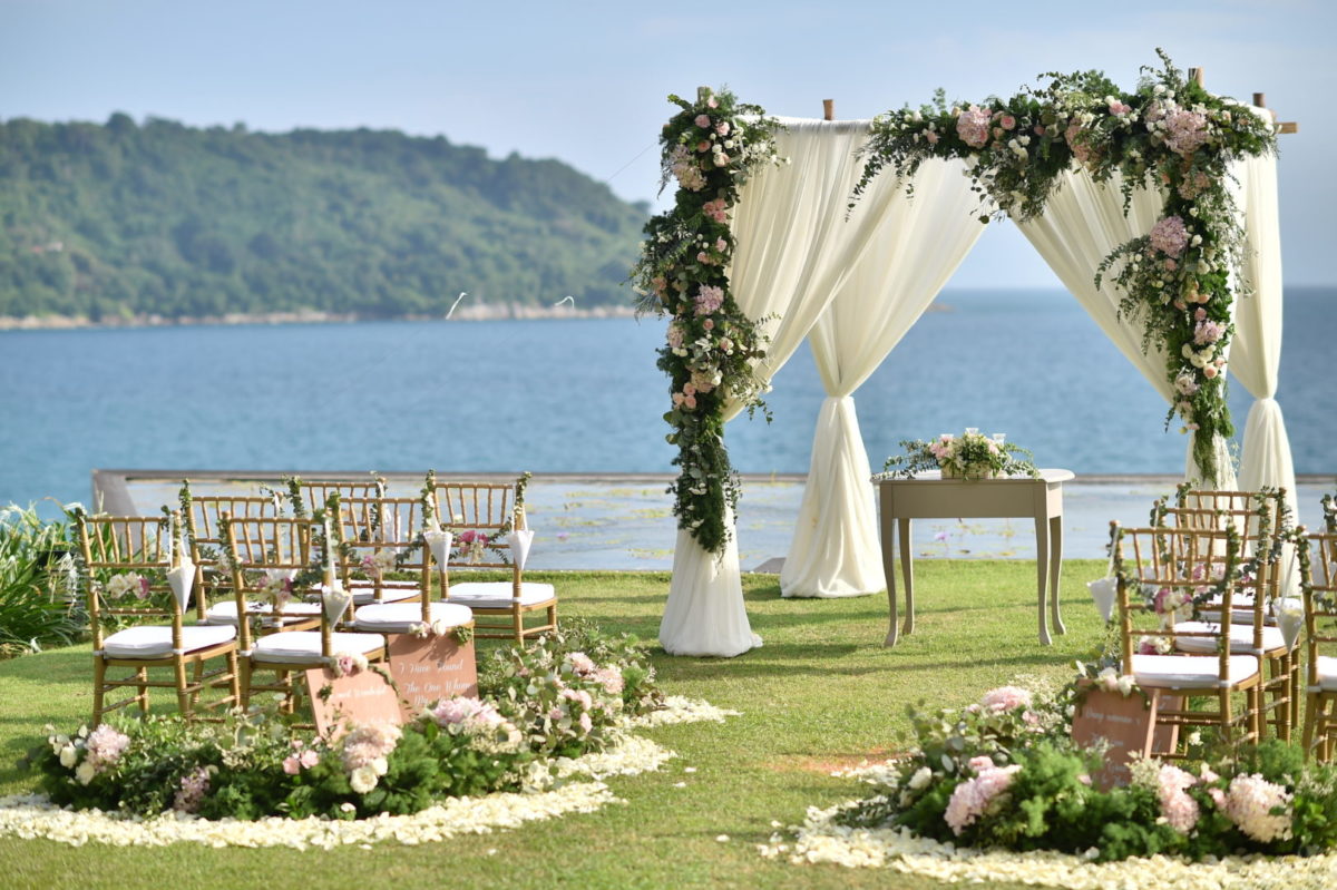 Wedding set up beside a blue lake