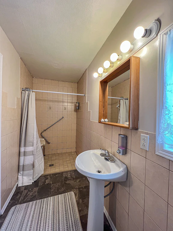 Wheelchair accessible bathroom and shower.