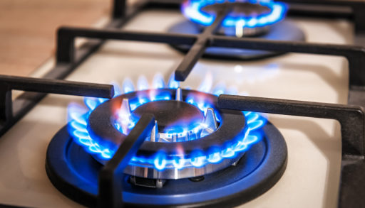 Natural gas stove burning