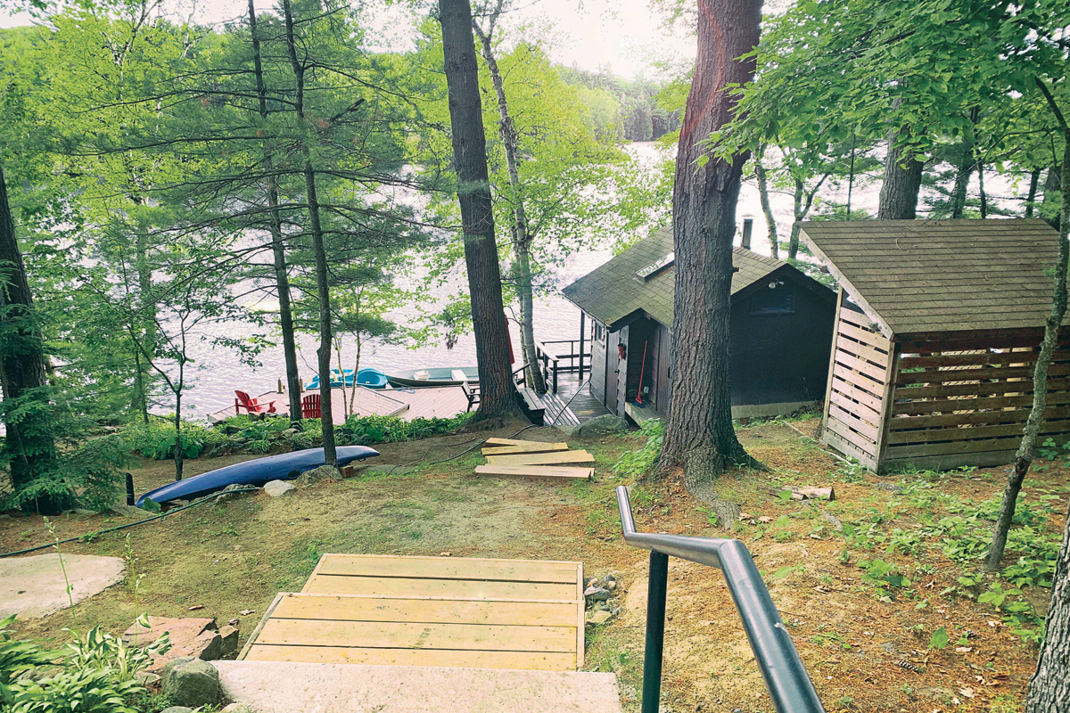 looking down the stairs leading to the Finnish sauna and the lake