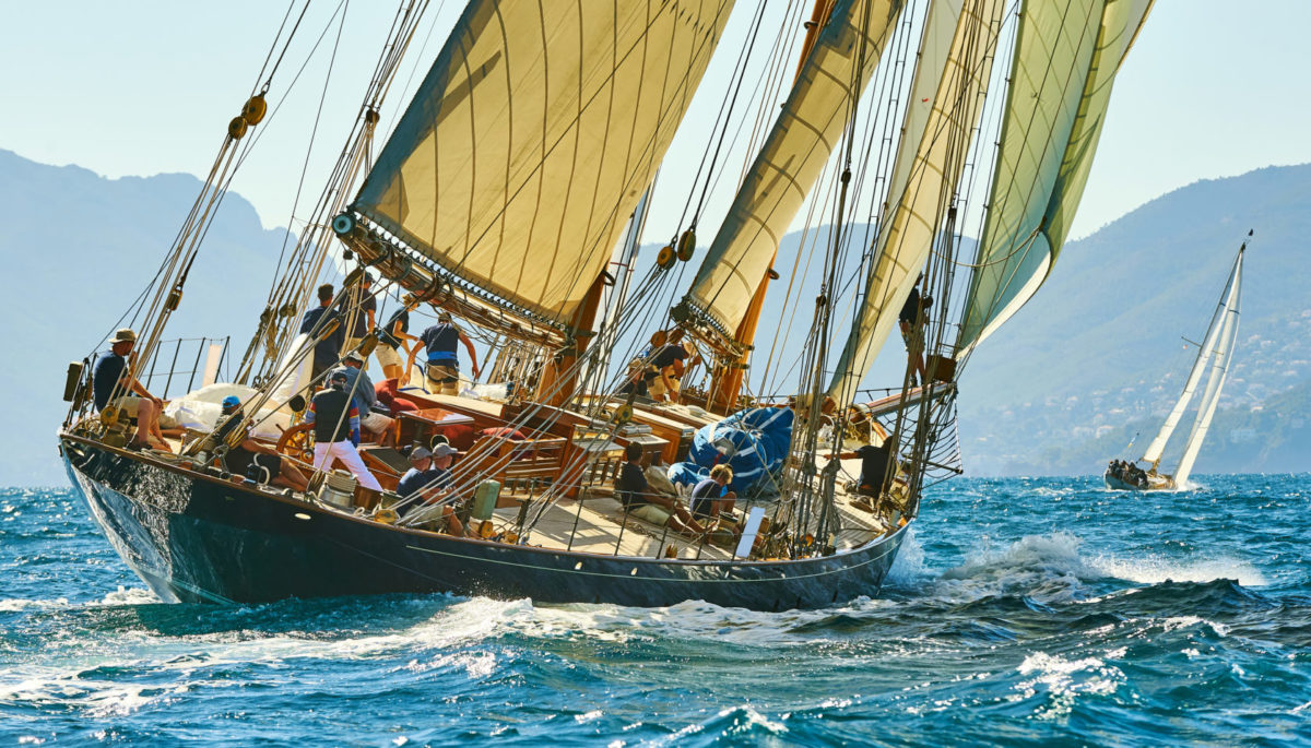Sailing yacht under full sail at the regatta.
