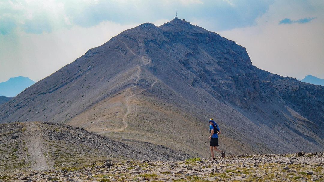 An endurance racer faces a large mountain.