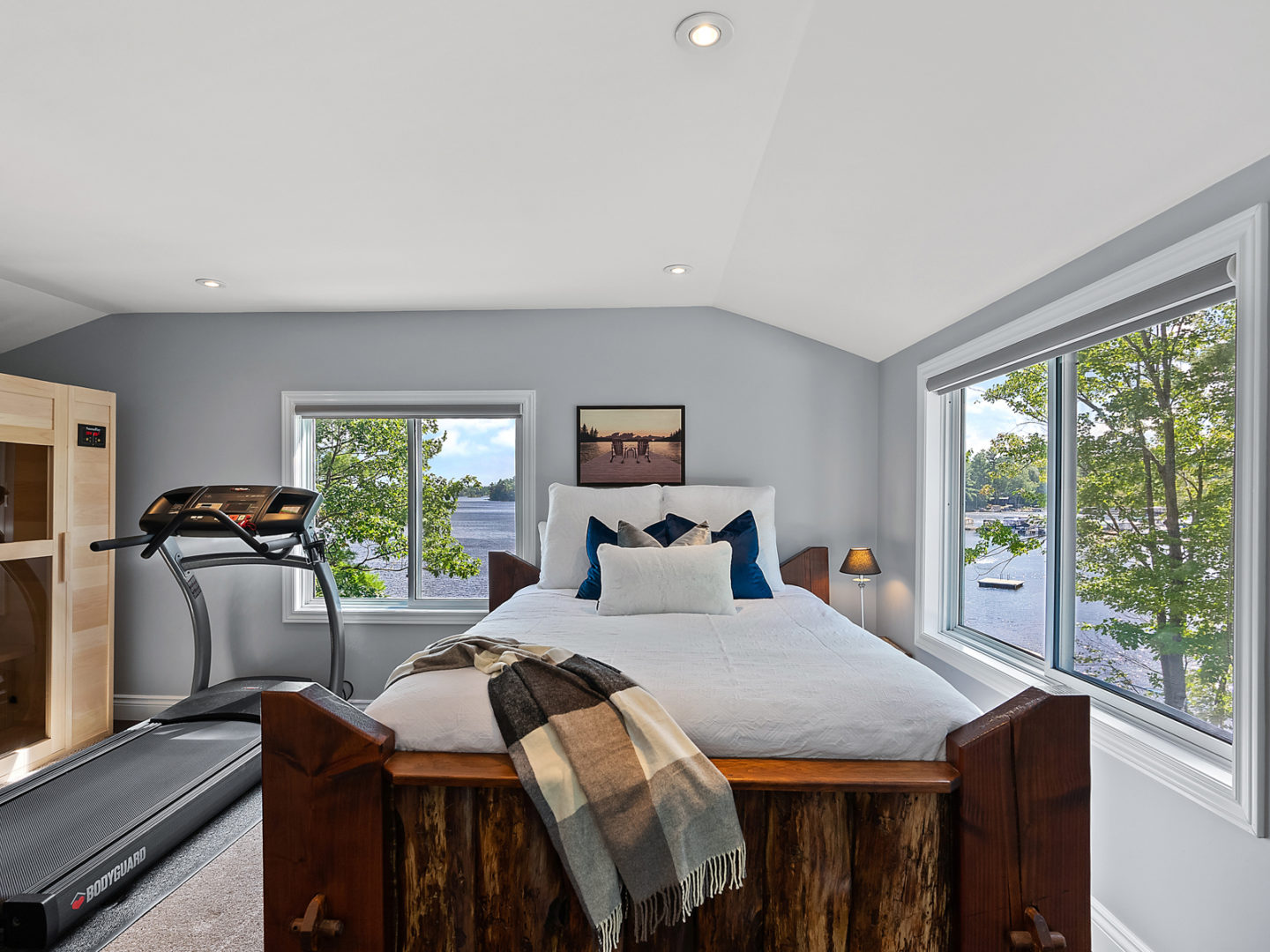 Queen bed inside large second-level bedroom