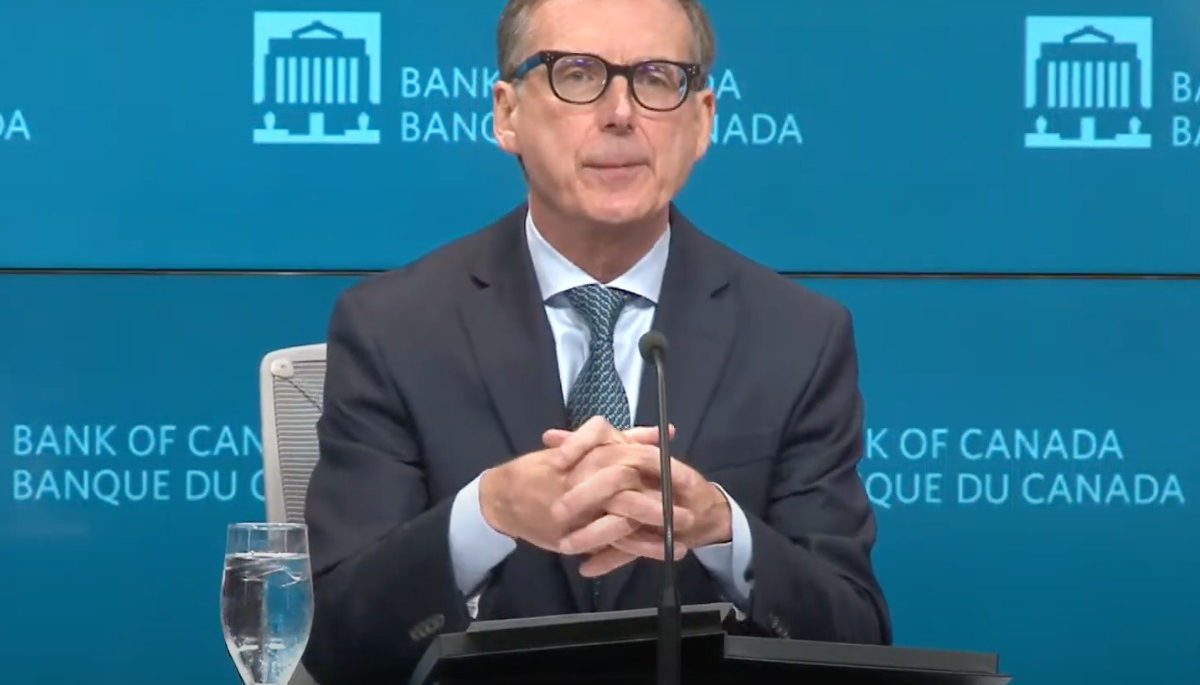 Tiff Macklem delivers news about the Bank of Canada raising interest rates in a press conference on October 26, 2022
