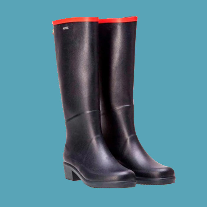 tall black rubber boot with red piping