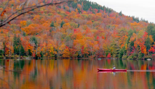 Beautiful fall landscape with lake and mountains, fall cottage real estate market
