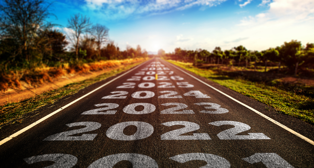 A highway stretching out through the photo, with 2021-2025 written on it