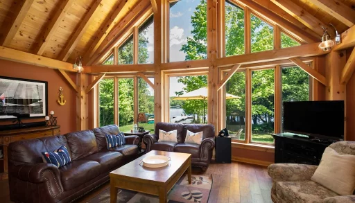 large post and beam construction with floor-to-ceiling windows