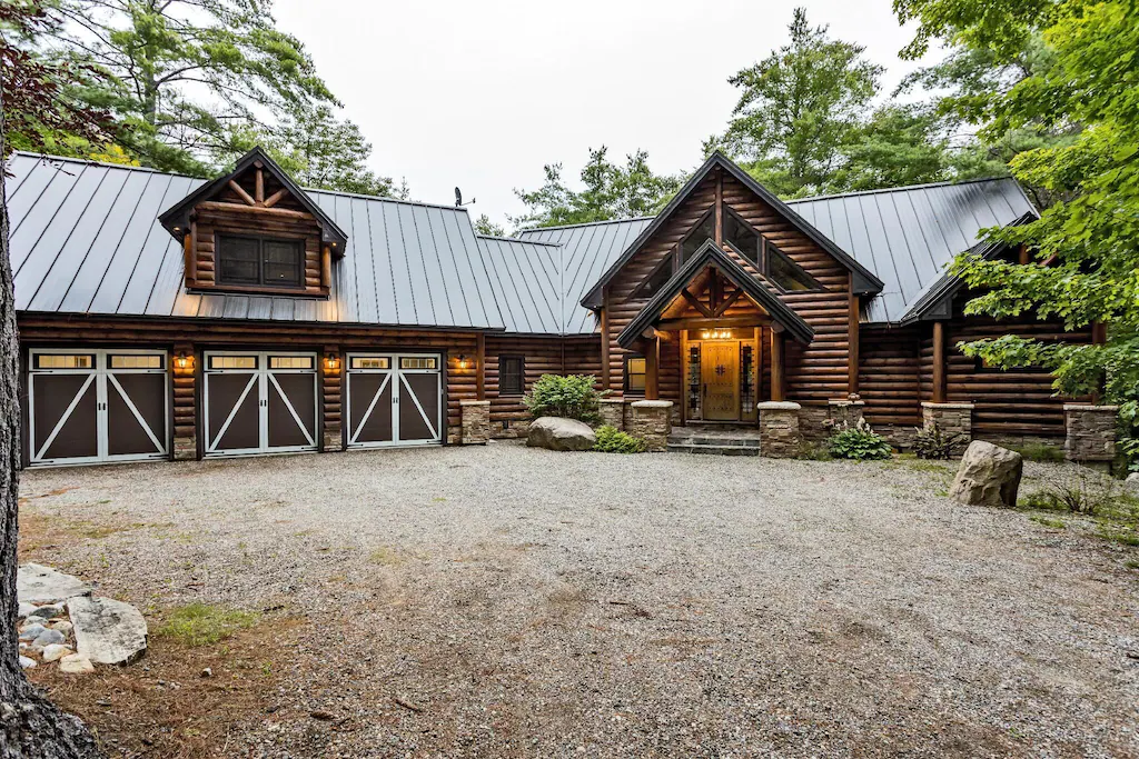 Back of the chalet with three car garage
