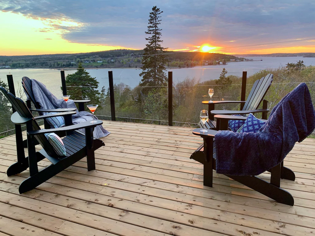chairs on deck overlooking water