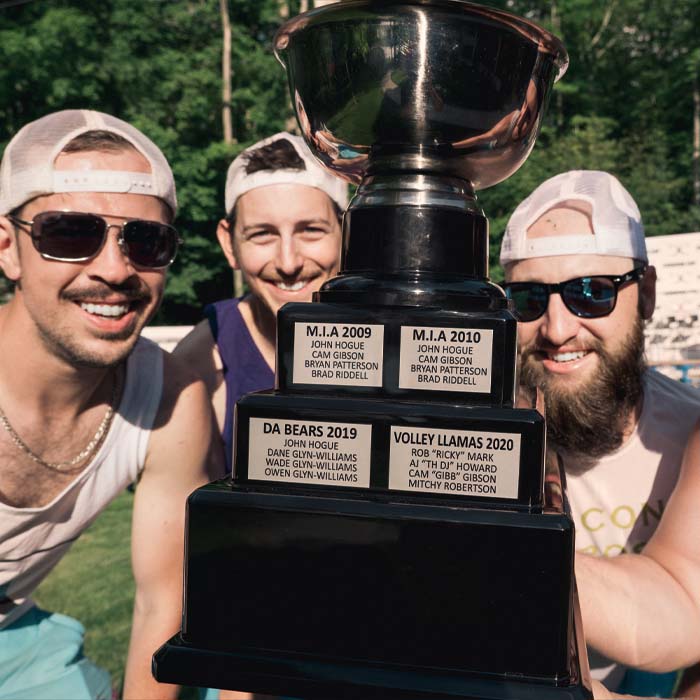 A group of men holding the Cordova Cup