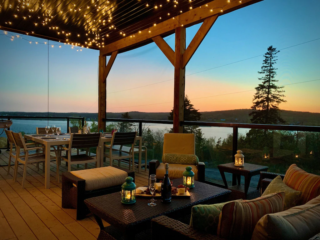 Outdoor patio with fairy lights at sunset
