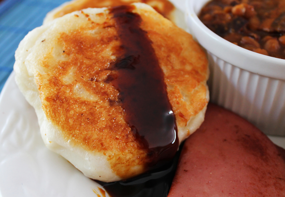 Close-up of a touton, a fried bread with molasses