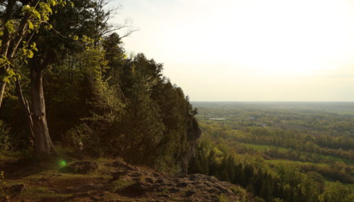 Sunset from the background of the top of a cliff. Mount Nemo Conservation Area in Ontario Canada, a hotspot for outdoor climbing and hiking. Bill 23