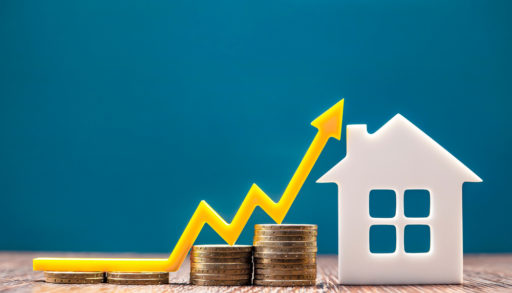Real estate market, graph, up arrow. House model and a stack of coins. The concept of inflation, economic growth, the price of insurance services