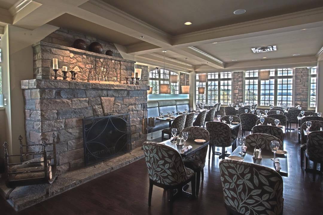 A grand fireplace inside the dining hall