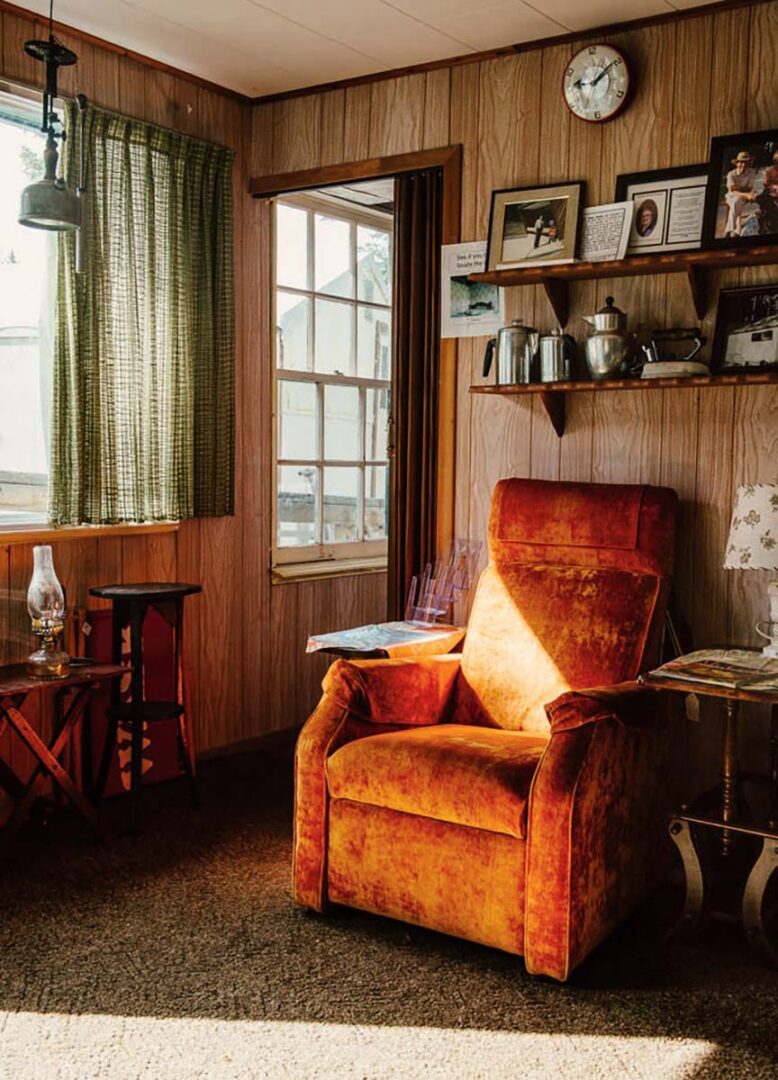 1970s style red vintage recliner chair sititng in a sunny room at the cottage