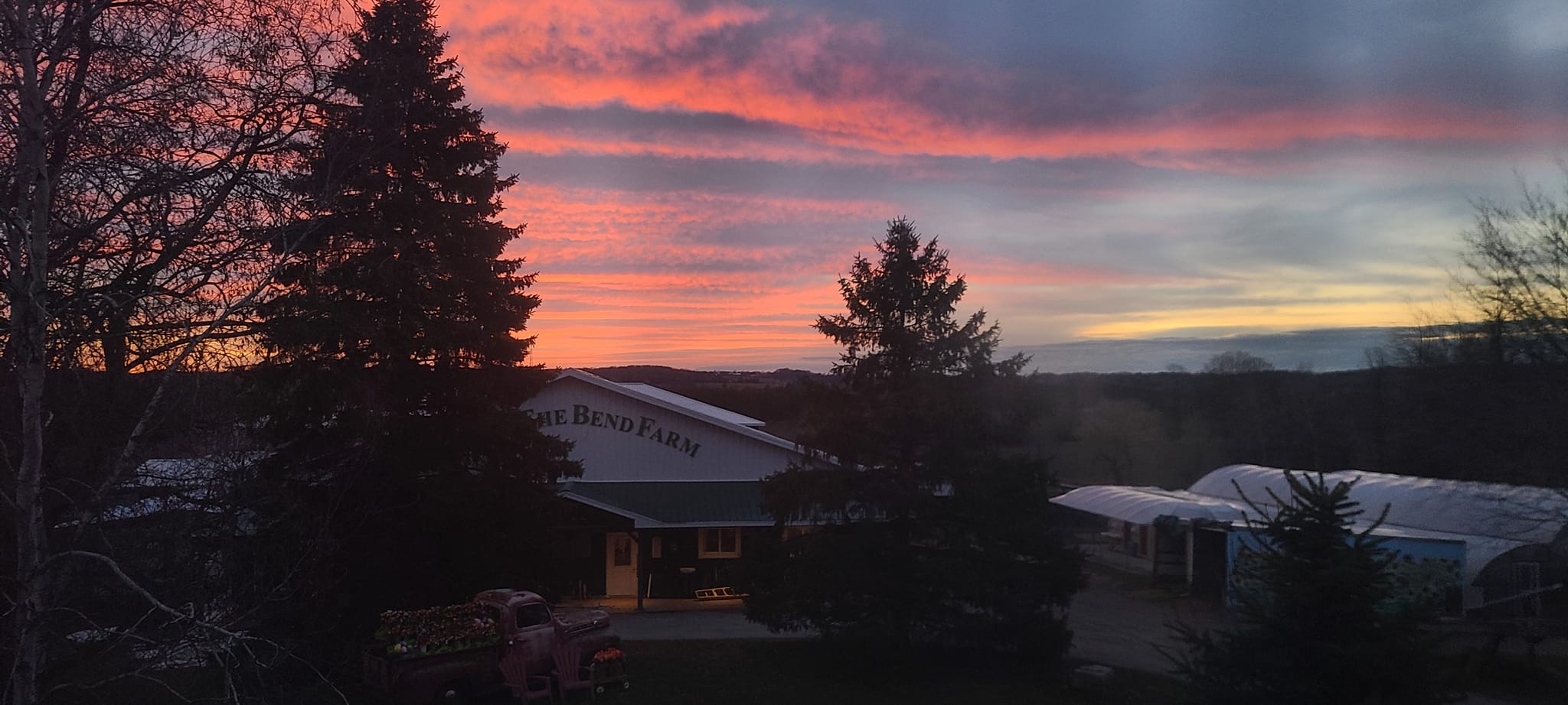 exterior of Round the Bend Farm at dusk