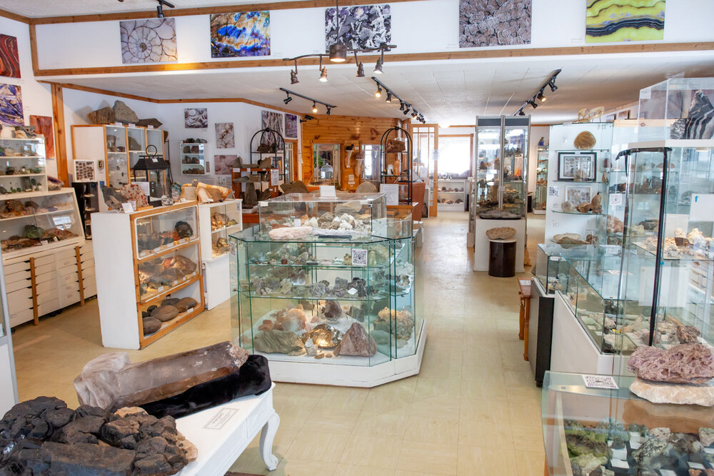 inside of Crystal Cave Mineral Exhibit and Crystal Shoppe in South River with crystal display cases