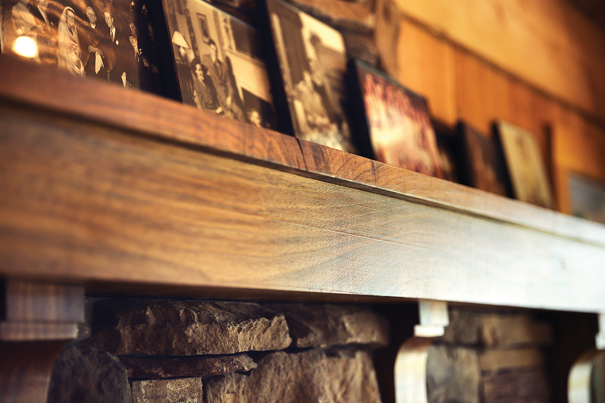 Close-up of the Crowder's mantle with family pictures
