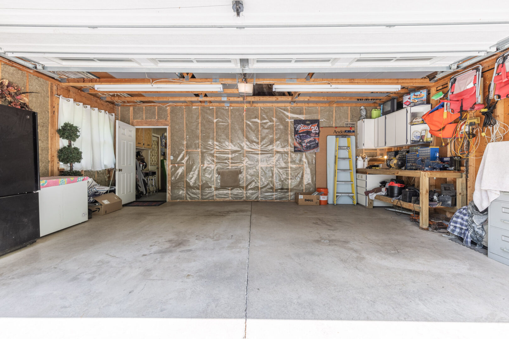 A big garage space with lots of room for storage.
