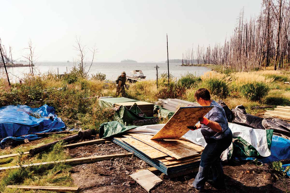 Pam and Eric moving building materials