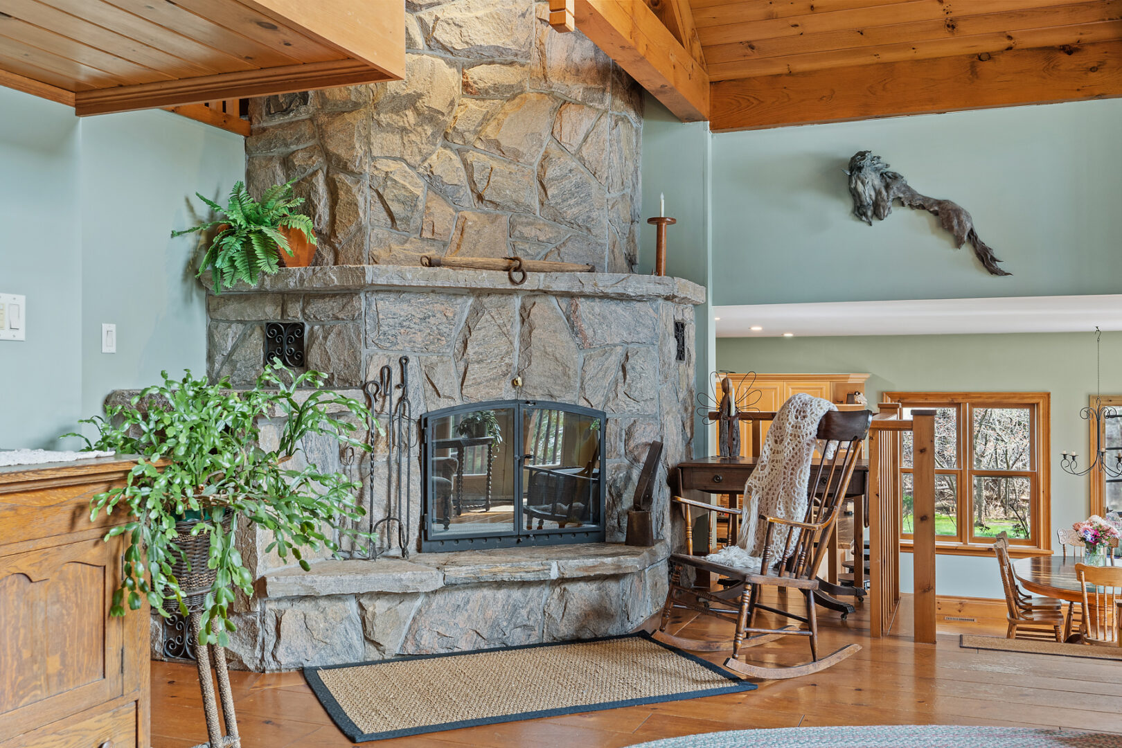A large stone fireplace.