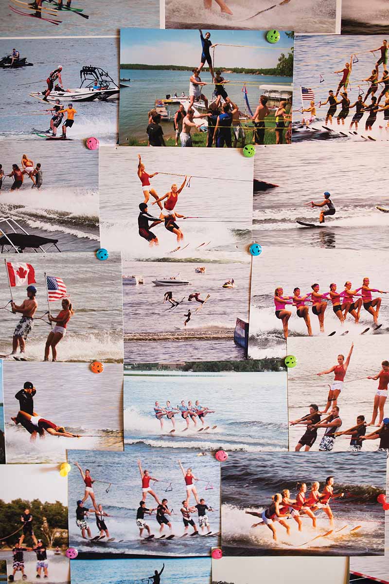 Photos from Club de Skinautique shows pinned to a bulletin board in the Teetaert family cabin on Lake Metigoshe.