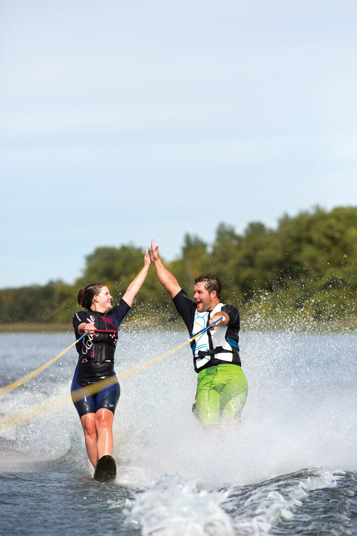 Siblings and fellow Club de Skinautique members Jamie and Amie Teetaert waterskiing together on Lake Metigoshe on Sunday, September 11, 2016.