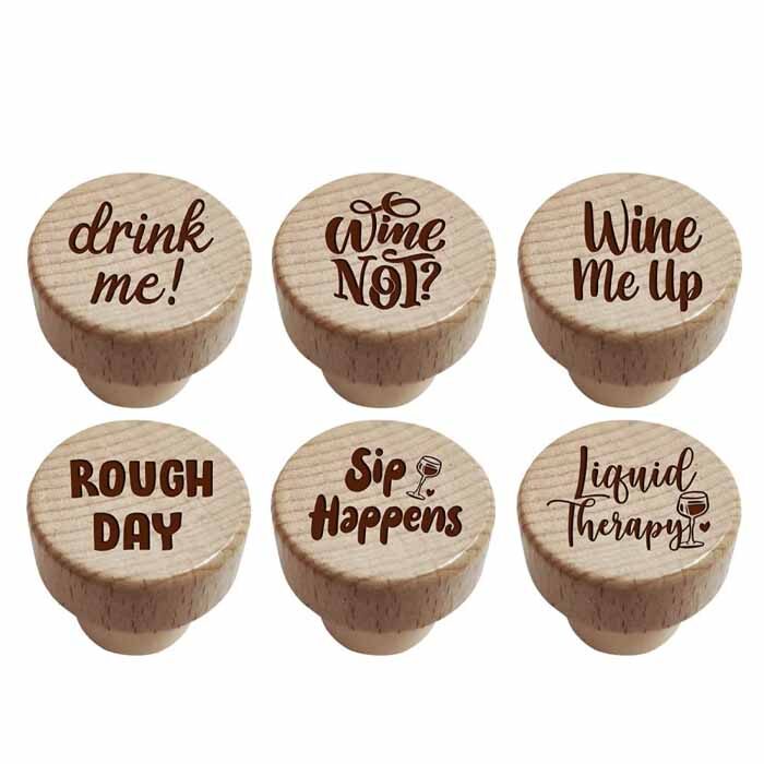 Wooden wine stoppers with funny wine-related puns on them