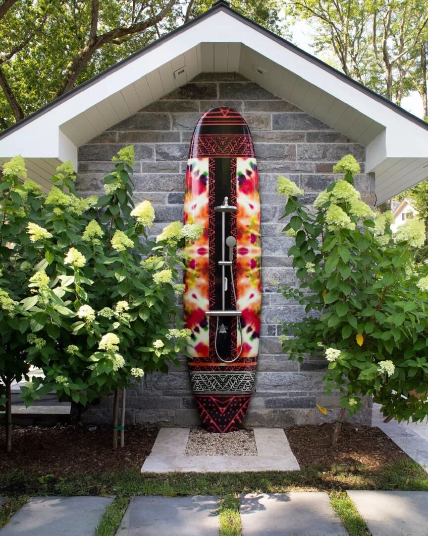 tie-dye paddleboard turned into an outdoor shower