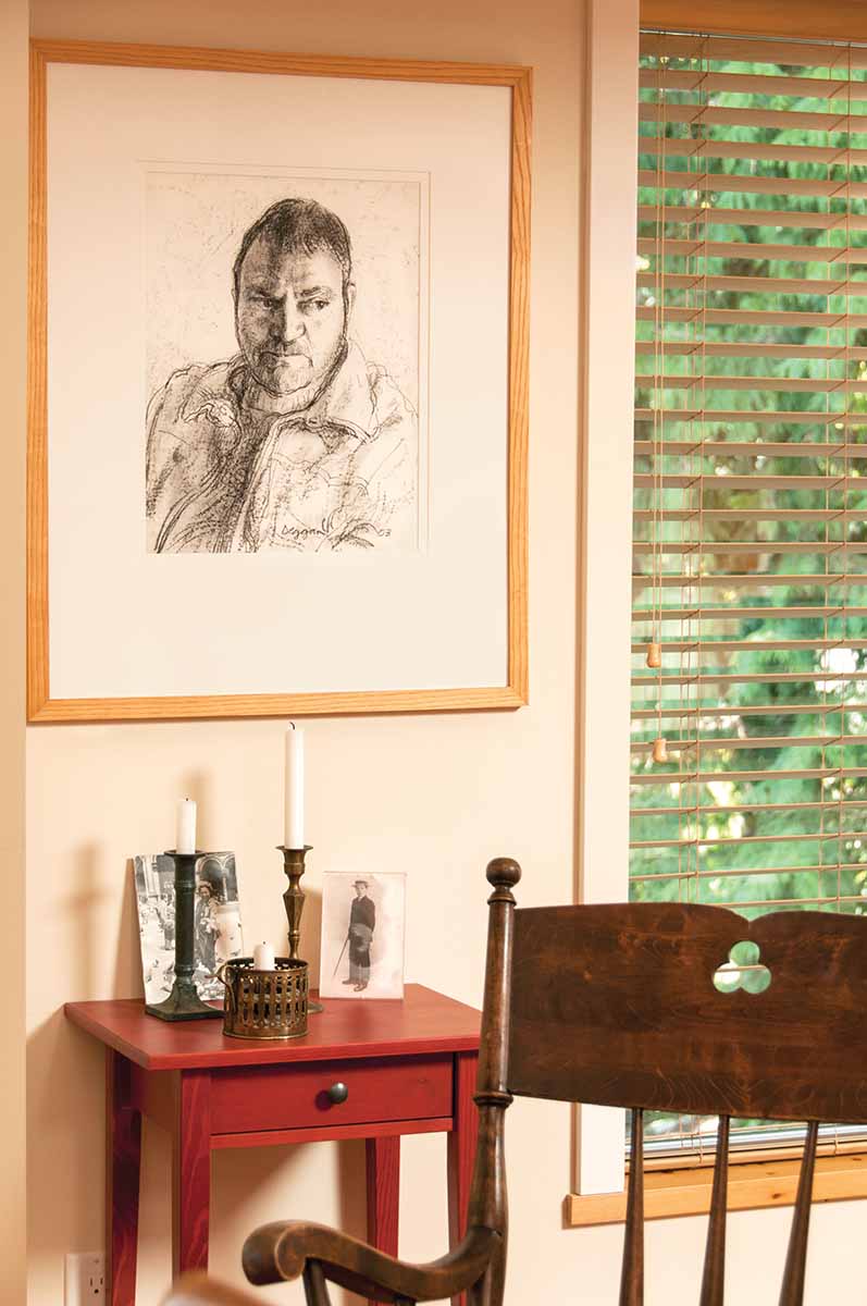 Paul’s conté crayon portrait of their friend Antoine in the living room