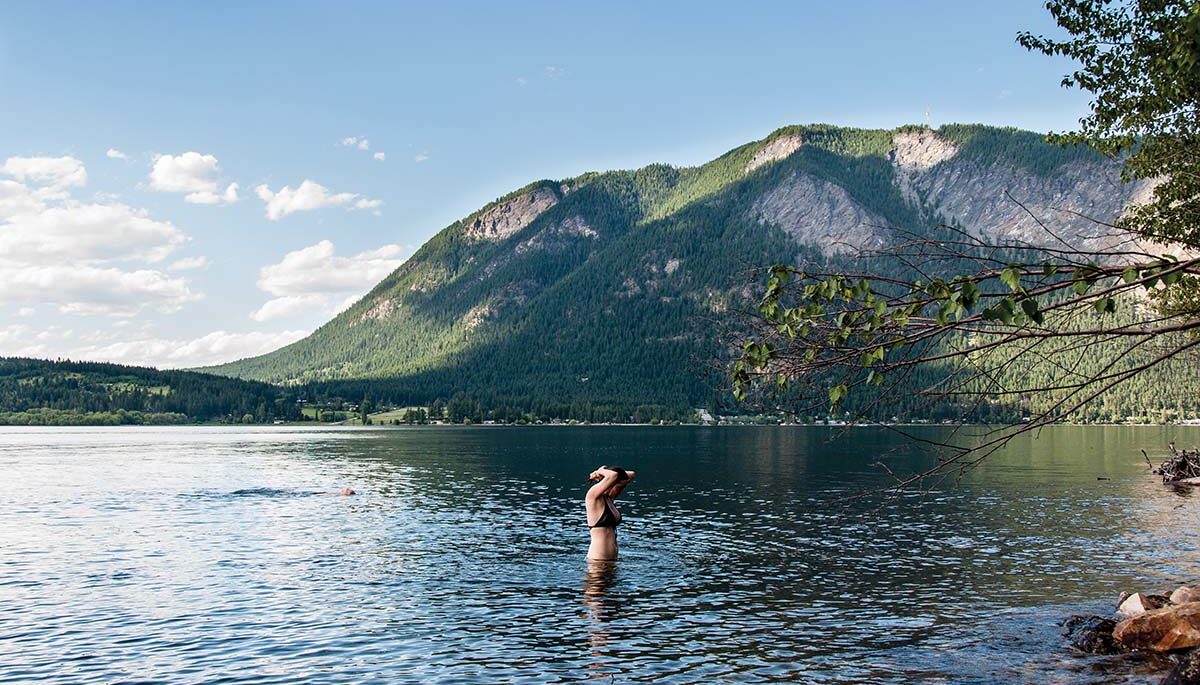 The Vezanni's daughter, Viviana, swims in front of the cottage