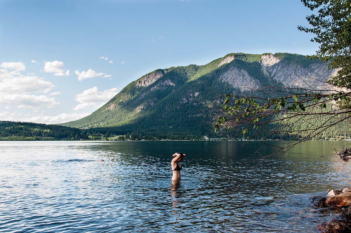 The Vezanni's daughter, Viviana, swims in front of the cottage