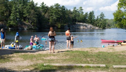 Family plays on seguin cottage waterfront