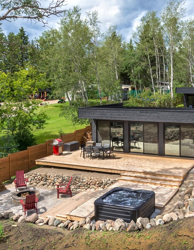 backyard from a different angle including hot tub