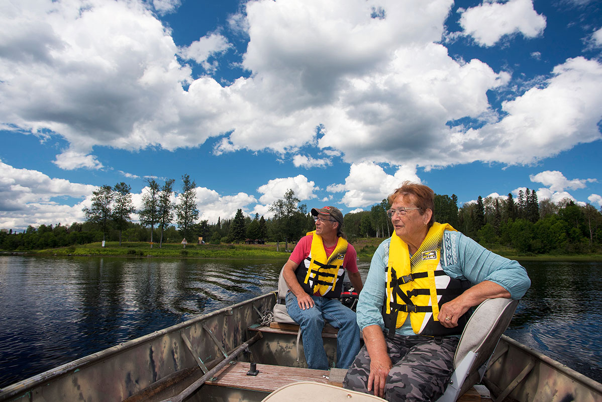 Jane Armstrong and he nephew David Ethier on the lake in their boat
