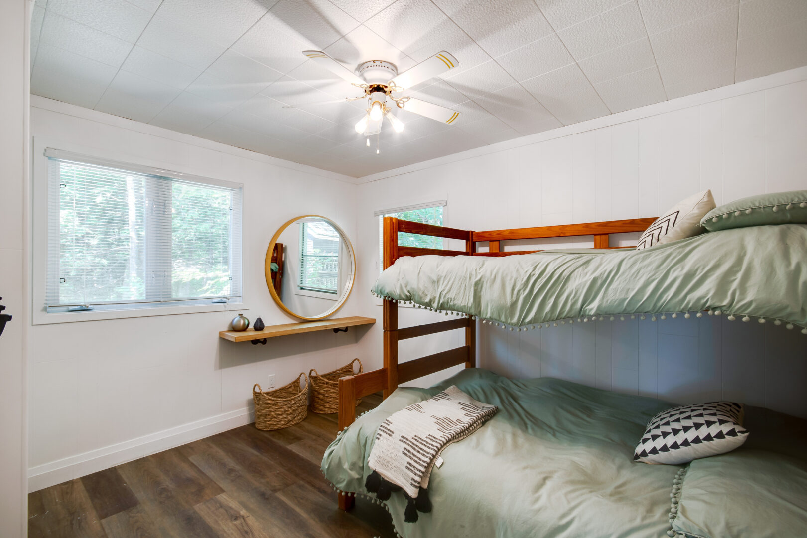 A bright bedroom with bunk beds.
